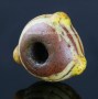 Ancient Germanic glass bead with white glass trail